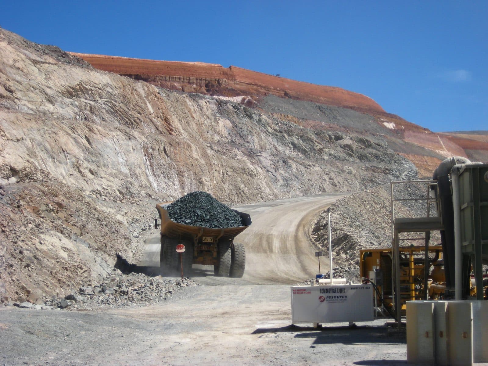 Truck loaded with ore leaving the mining face