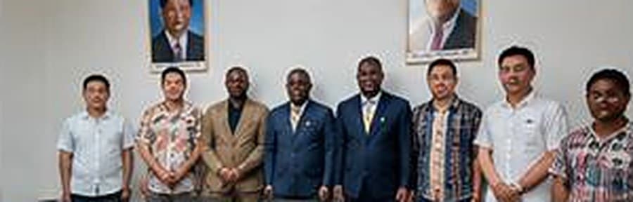 The MKL Mining team with partners at an official meeting